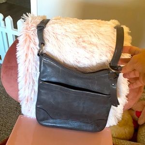 Frye gray leather crossbody bag size medium. Used like twice and looks new.